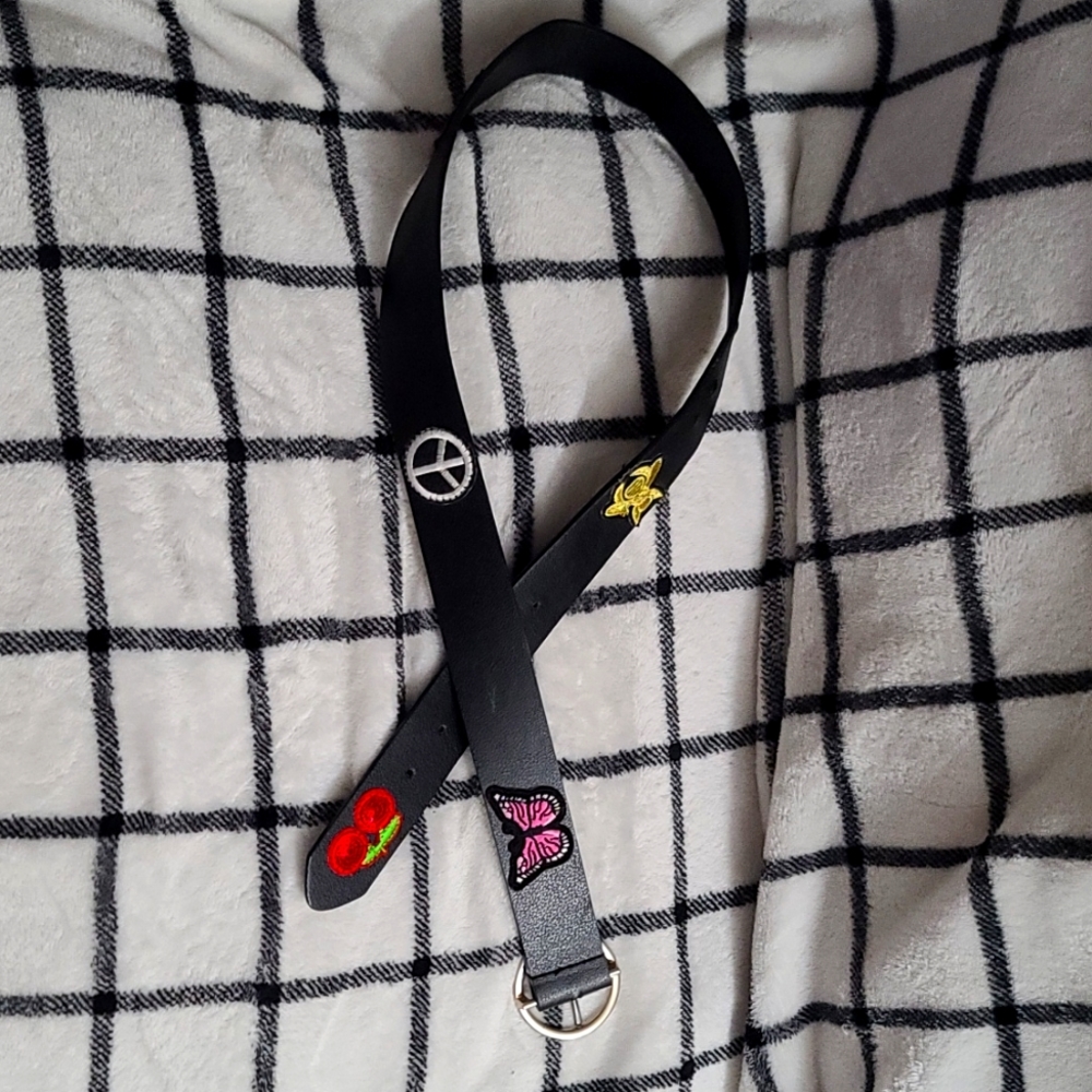Medium Time and Tru belt black with stitched on patches.